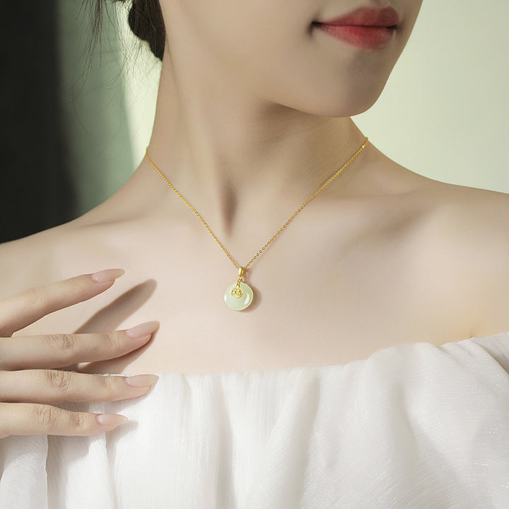 The New Nafu Peace Button And Field Jade Necklace 18K Gold.